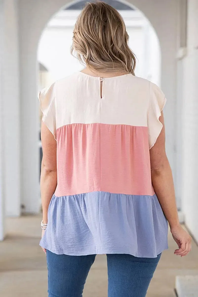 Get Noticed in Style with our Plus Size Colorblock Ruffle Top