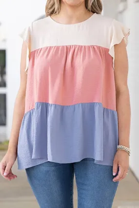 Get Noticed in Style with our Plus Size Colorblock Ruffle Top