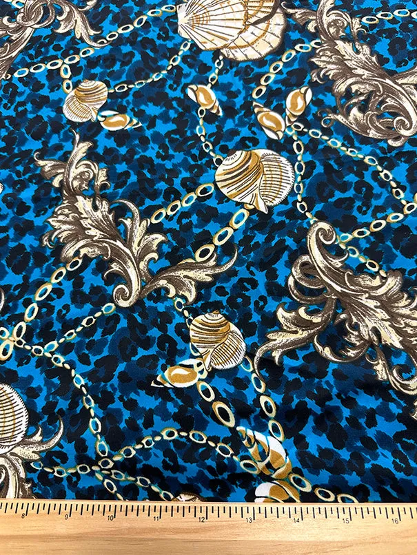 Turquoise Shells Print on Cheetah Poly Charmeuse Satin Fabric