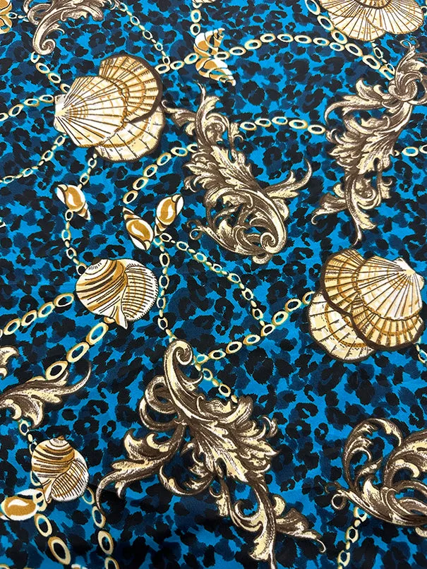 Turquoise Shells Print on Cheetah Poly Charmeuse Satin Fabric